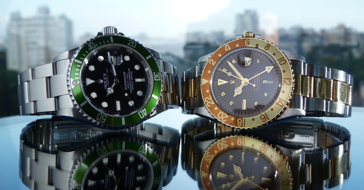2 rolex watches kept on a glass table
